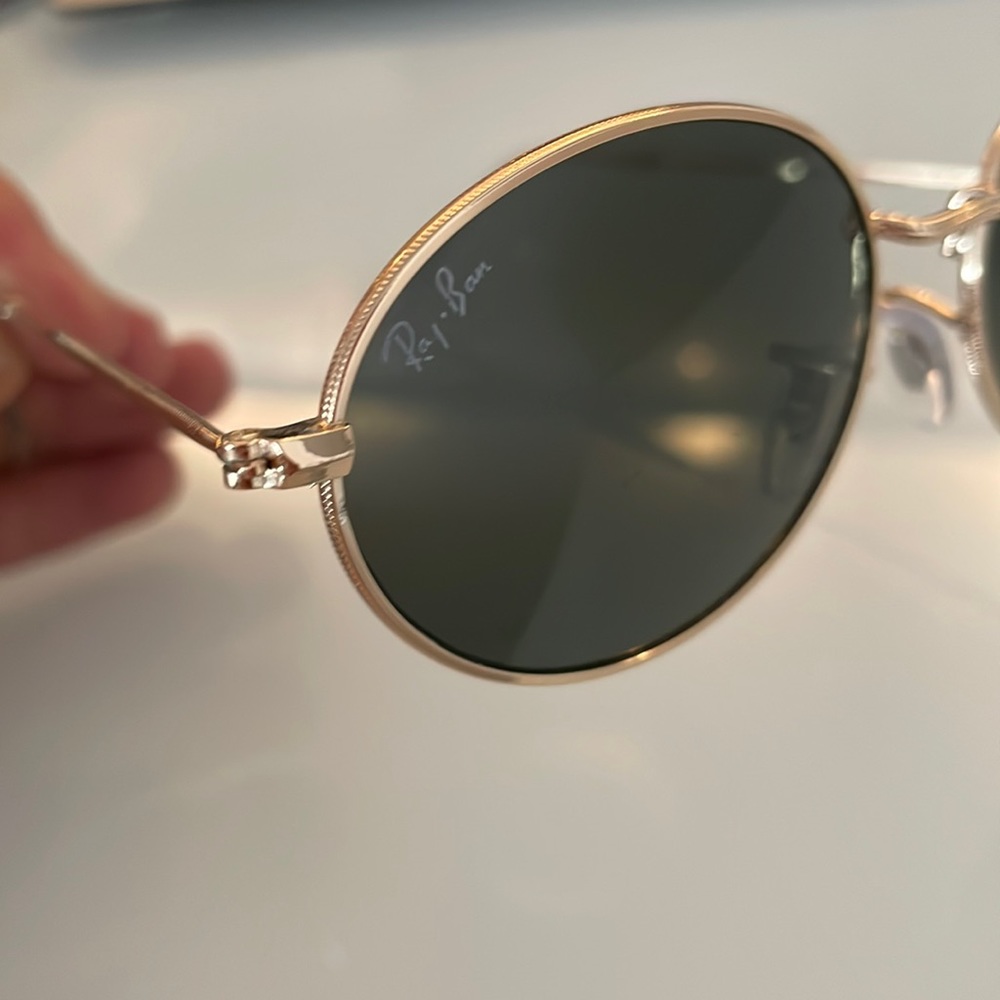 Ray-Ban gold oval shaped sunglasses